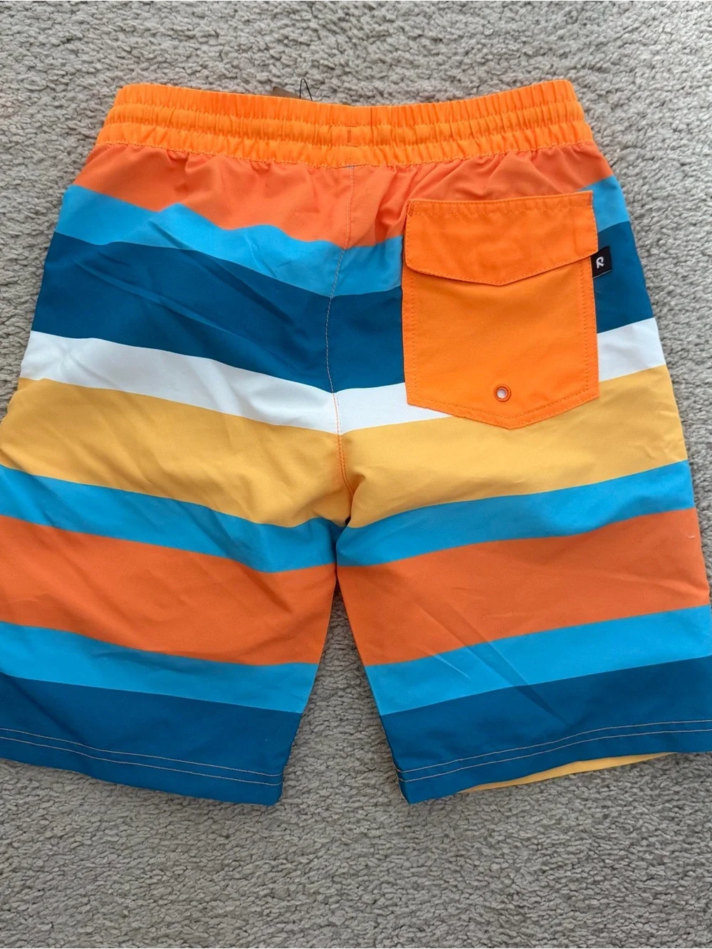 Reima new with tags Boys Orange & Blue Striped Swim Trunks size 9 youth